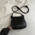 Retro black leather small crossbody square bag with knotted strap and white text logo - Black