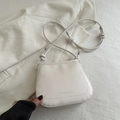 Creamy white PU leather crossbody bag with minimalist knot strap and silver accents - White