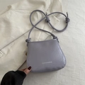 Minimalist lavender vintage small square shoulder bag in polished PU leather finish - Purple