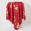 Elegant red satin silk scarf with yellow floral prints displayed on a white stand - Red Floral