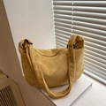 Minimalist ginger yellow corduroy hobo bag with adjustable strap and casual design - Yellow