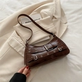 Vintage brown baguette bag with silver metal eyelets and decorative buckles - Brown
