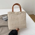 Minimalist straw tote bag with brown leather handles and V-shaped weave texture - Brown