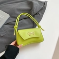 Fashionable bright green leather baguette bag with a stylish golden bow metal accent - Green