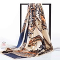 Elegant 90cm vintage paisley print silk satin square scarf displayed on a stand - Navy Orange Paisley