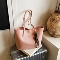 Pink lychee grain leather tote bag with FASHION logo and striped charm on a suitcase - With Pendant / Pink