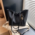 Large vintage black pebbled leather tote bag with gold charm and woven rope detail - With Pendant / Black