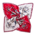 Close-up of silk scarf with equestrian chain print and elegant satin texture - Red + Pink
