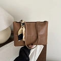 Brown patchwork leather tote bag with snakeskin texture and a silk scarf on handle - Tan