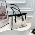 Chic cream canvas tote bag with black leather trim and cute plush charm pendant - With Pendant / Black