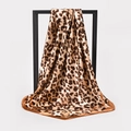 Classic brown leopard print satin silk square scarf hanging on a minimalist display frame - BX151 Gold Leopard