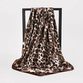 Classic leopard print satin silk square scarf with brown border hanging on a rack - BX151 Brown Leopard