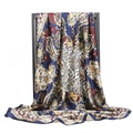 Navy blue paisley satin square scarf with vintage floral patterns hanging on a black rack - 90*90cm / Vintage Brown