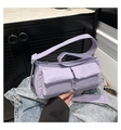 Detail of lavender nylon shoulder bag with functional flap pockets and minimalist utility style - Purple