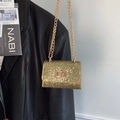 Sparkly gold sequin mini handbag with elegant chain strap and metallic twist lock - Gold
