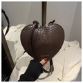 Detail of heart-shaped dark brown shoulder bag with woven texture and crocodile pattern - Coffee