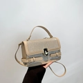Chic beige glitter crossbody bag with metallic twist lock and top handle for women - Khaki