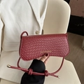 Elegant burgundy woven crossbody bag with gold fashion lettering and thin shoulder strap - Red