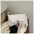 Detail of white woven leather bag with gold buckle and honeycomb texture for women - White