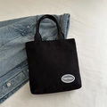 Minimalist black corduroy tote bag with large capacity and FANYISSA brand label - Black