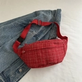 Women's red tweed belt bag with gold stitching and adjustable strap on denim - Red