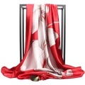 Red satin silk scarf with large white lily floral print on a minimalist metal rack - Red Lily (#8)