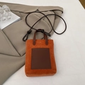 Mini borsa tote in pelle scamosciata arancione con tasca marrone e tracolla con nodo - Arancione