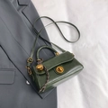 Dark green vintage crossbody bag with polished finish and gold-tone twist lock - With Pendant / Green