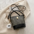 Vintage dark green bucket bag with black leather base and white furry eye pendant - With Pendant / Dark Brown