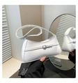 Detail of white baguette underarm bag featuring decorative silver buckle and PU leather texture - White