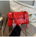 Minimalist red faux leather shoulder bag with chic woven charm accessory detail - Burgundy Red With Charm