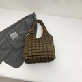 Brown quilted puffer tote bag with square stitching and soft padded fabric handle - Brown