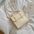 Cream colored faux leather minimalist backpack with golden hardware in a vintage style - Off-white