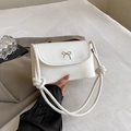 Chic white square crossbody bag featuring a silver metal bow and knotted leather strap - Matte White