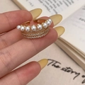 Detail of gold multilayer ring featuring seven white pearls and shimmering zircon accents - Gold Multi-layer Zirconia Pearl Open Ring