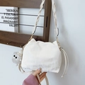 White pleated drawstring bucket bag with woven handle and plush owl keychain charm - With Pendant / Off White