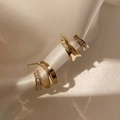 Macro shot of gold-plated double C-shape earrings with cubic zirconia on white silk - Gold Double Layer Zircon Earrings (Real Gold Plated)