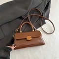 Vintage brown leather handbag with gold buckle and adjustable strap in professional style - Light Brown