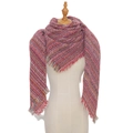 Thick red and pink plaid knit scarf with fringe displayed on a wooden mannequin torso - 135x135cm / Red
