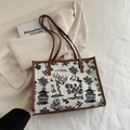 Bolso tote de lona blanca con estampado de paisajes y ribetes de cuero marrón elegante - Marrón