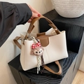 Chic off-white litchi grain leather tote bag with brown contrast handles and plush charm - White With Pendant