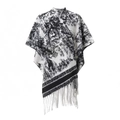 Detail of knit shawl featuring black forest silhouette pattern and white fringe tassel trim - 03# Black & White Ink Wash