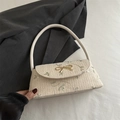 Borsa a tracolla in paglia crema con ricami floreali e fibbia a fiocco d'oro - Bianco