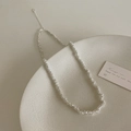 Collier minimaliste en perles argentées avec texture métal liquide et fermoir réglable - Argenté