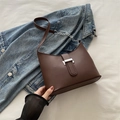 Minimalist coffee brown faux leather underarm bucket bag with silver buckle and chain strap - Brown