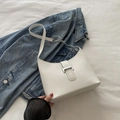 White faux leather hobo shoulder bag with silver buckle and metal chain detail - White