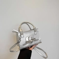 Silver metallic small crossbody bag with bow detail and heart stitching pattern - Silver