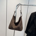 Brown suede hobo tote bag featuring a minimalist knotted shoulder strap design - Brown