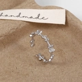 Silver butterfly ring with zircon accents and twisted rope band on a natural background - Silver Butterfly Open Ring