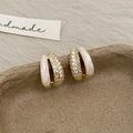 Detail of gold-plated C-shaped earrings with white enamel and multi-row zircon stones - White Drip Oil Zircon Earrings